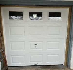 Garage door with glass windows at the top