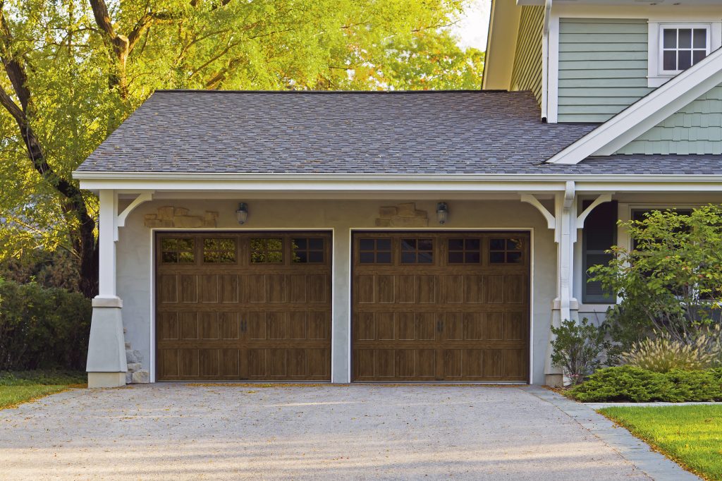 two car garage with windows on the doors